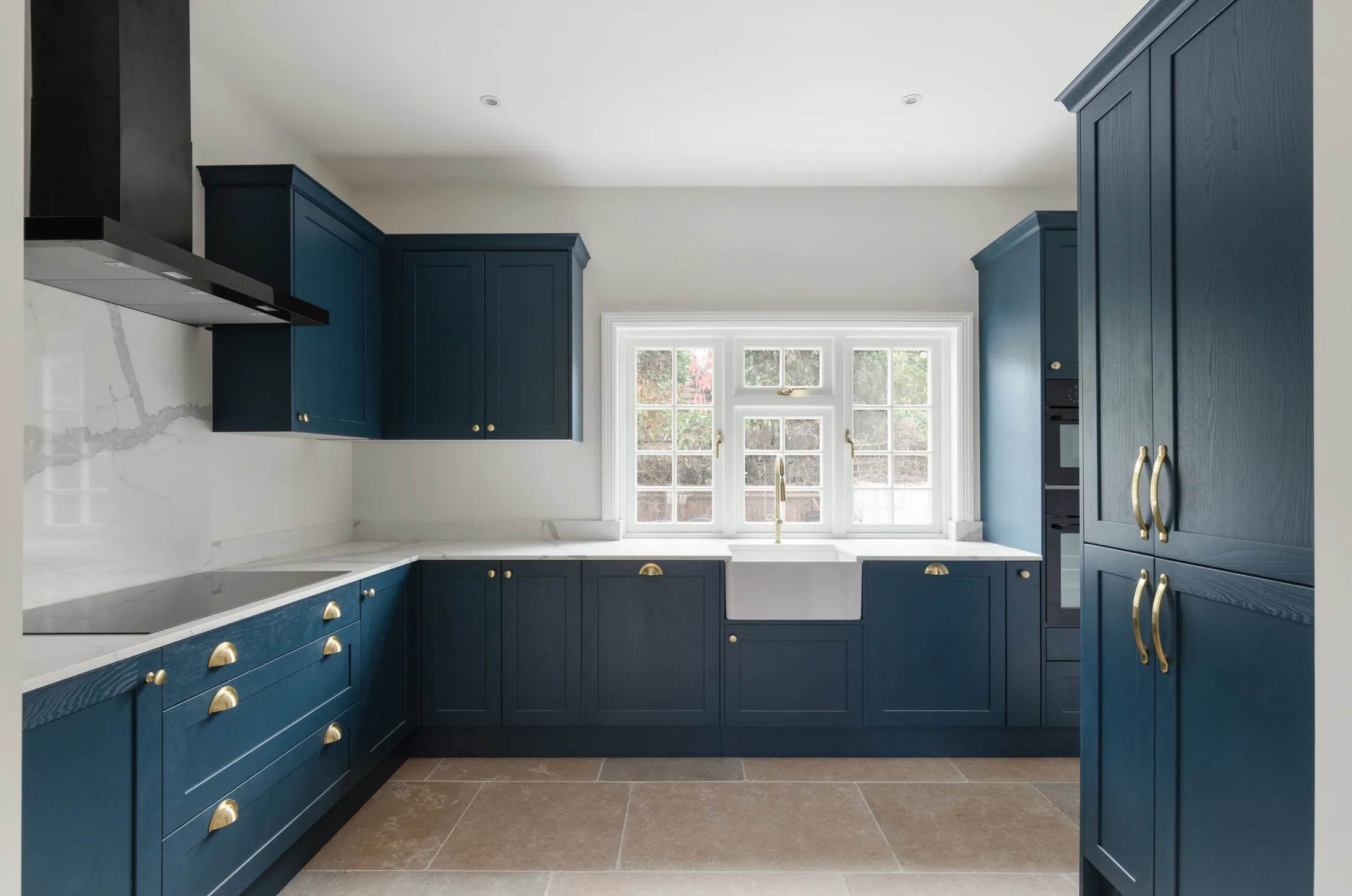 Completed blue kitchen and herringbone floor at Angel Road