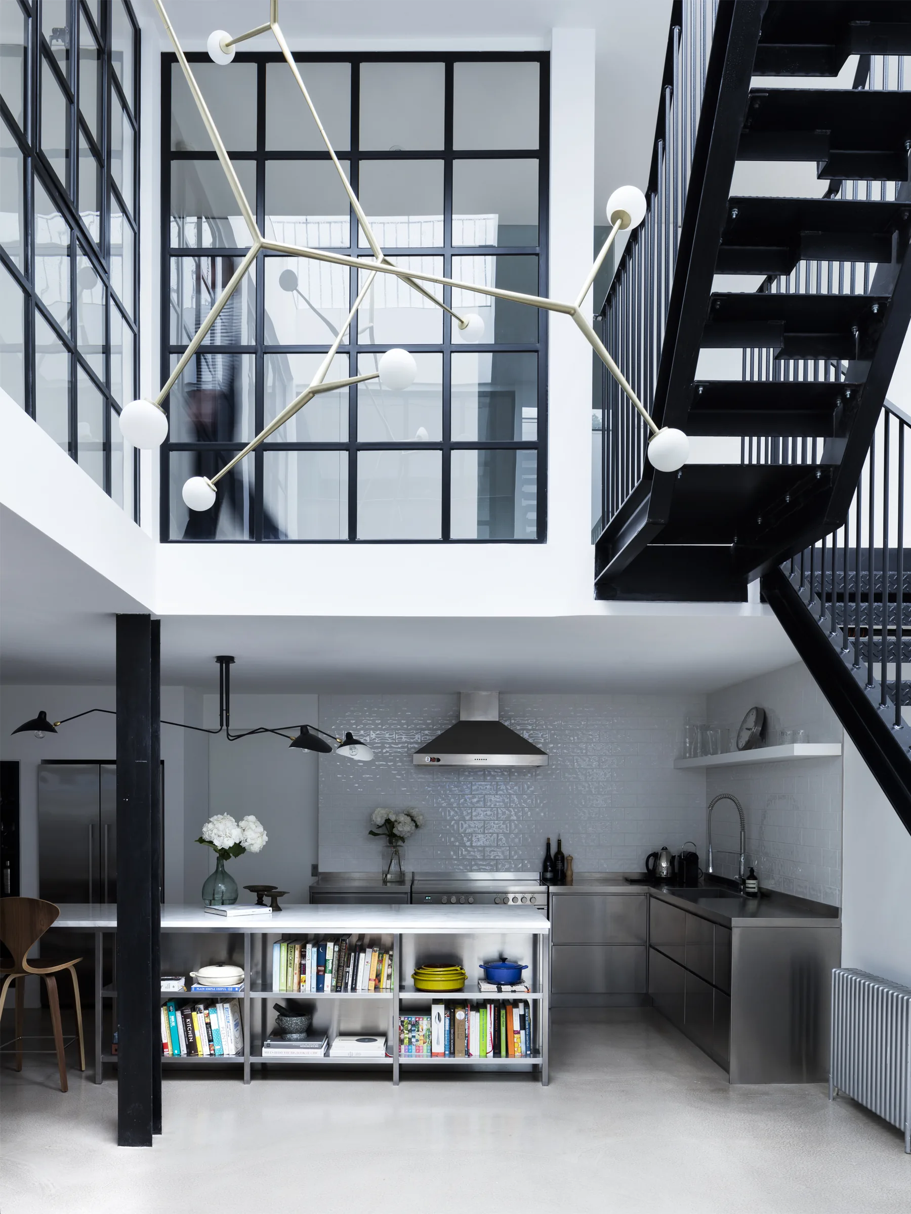 Industrial-style mezzanine and kitchen at Florida Street